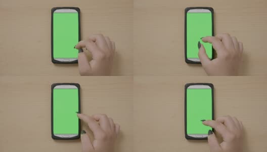 十几岁的女性使用带有色度键绿色屏幕的智能手机，在社交媒体上滑动屏幕可以放大或缩小高清在线视频素材下载