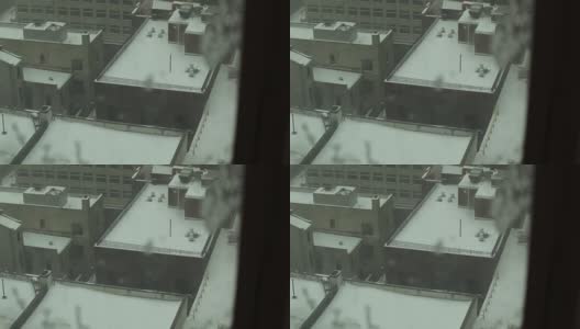 纽约布鲁克林市中心的窗户下起了雪高清在线视频素材下载