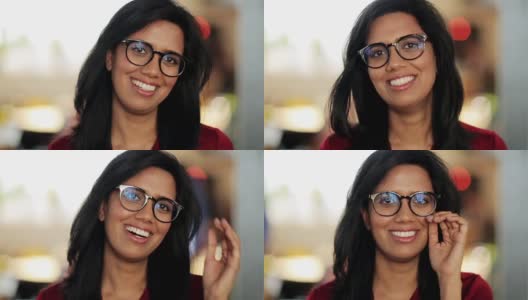 戴着眼镜的快乐微笑的印度女人的肖像高清在线视频素材下载