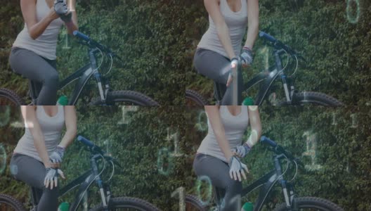 对戴自行车手套的妇女进行二进制编码数据处理高清在线视频素材下载