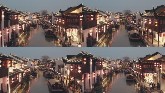 夜间，中国苏州运河镇的无人机拍摄。高清在线视频素材下载