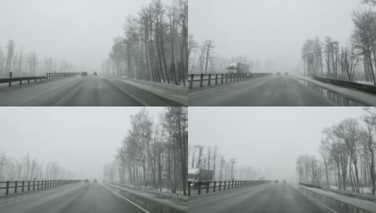 04.03.2021莫斯科。大雪中，俄罗斯高速公路上的汽车挡风玻璃高清在线视频素材下载