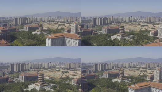 航拍现代城市中具有中国特色的古塔高清在线视频素材下载