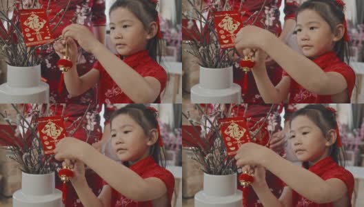 中国女孩为农历新年装饰高清在线视频素材下载