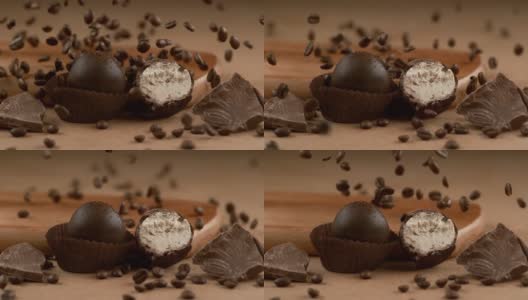 咖啡松露巧克力，咖啡豆在慢动作中落下。使用幻影Flex 4K相机拍摄。高清在线视频素材下载