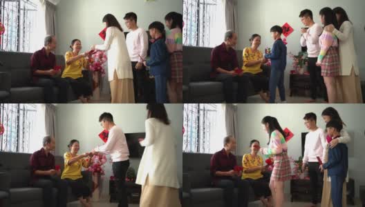 多代亚洲华人家庭在家里庆祝中国新年高清在线视频素材下载
