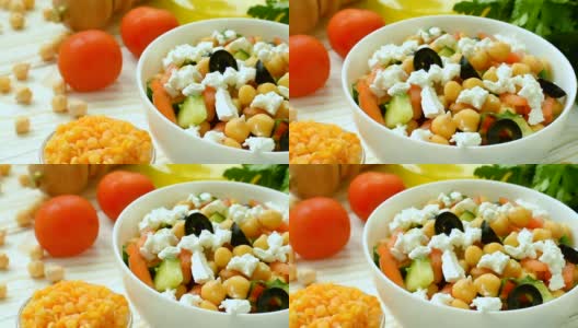 地中海鹰嘴豆沙拉配圣女果、羊乳酪和橄榄高清在线视频素材下载