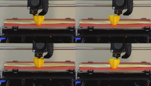 3D打印机建立对象黄色特写高清在线视频素材下载
