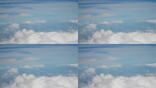 4 k鸟瞰图。飞过蓬松的白云蓝天。cloudscape背景高清在线视频素材下载