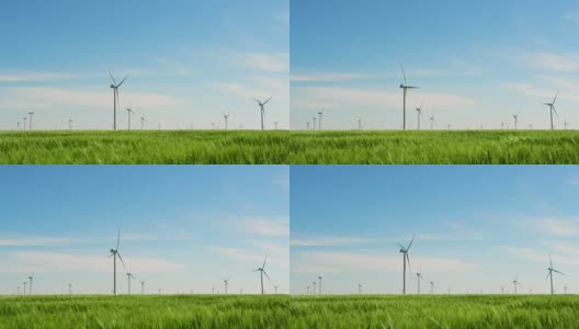 发电机组的风车在绿色的麦田里生产高清在线视频素材下载