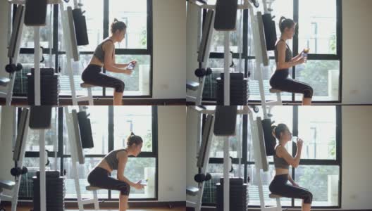 亚洲女人在健身房喝能量饮料高清在线视频素材下载