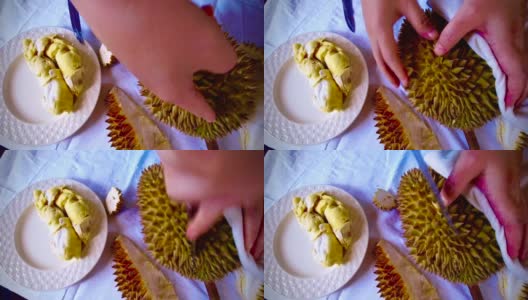 手剥新鲜成熟榴莲片段高清在线视频素材下载