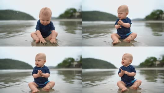 可爱的宝宝在沙滩上玩高清在线视频素材下载