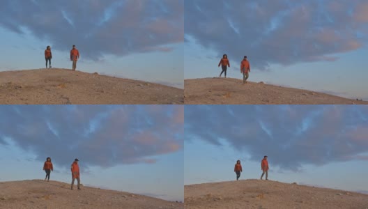 游客在冰岛的地热田漫步，天空湛蓝高清在线视频素材下载
