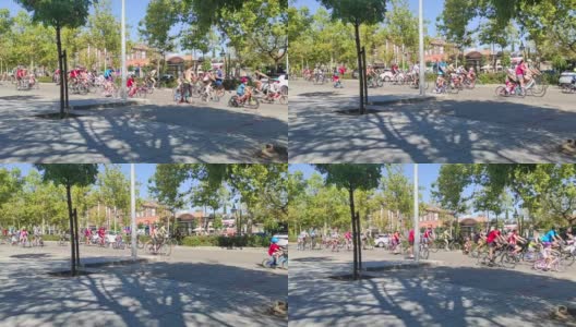 西班牙，马德里——9月11日:儿童和成人在马德里街头举行的自行车节。高清在线视频素材下载