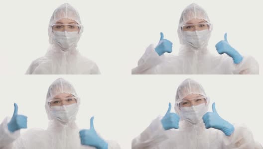 一个穿着防护服、戴着面具、手套和眼镜的女人的肖像，微笑着，竖起大拇指。结束冠状病毒大流行隔离。COVID-19流行高清在线视频素材下载