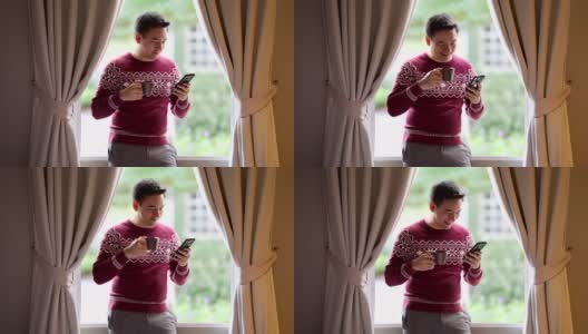 亚洲男人在圣诞节喝咖啡高清在线视频素材下载
