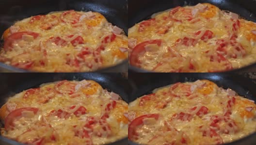 热煎锅上的美味煎蛋卷高清在线视频素材下载
