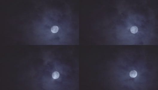 近月在夜空中是美丽的，从远处拍摄。高清在线视频素材下载