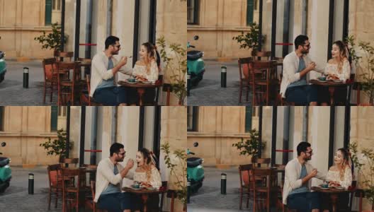 一对游客夫妇在欧洲的一家咖啡馆休息高清在线视频素材下载
