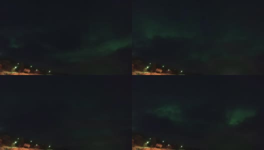 非常多云的夜晚和北极光高清在线视频素材下载