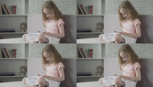 可爱的孩子学习很容易与互动手机应用程序上的gadget，教育高清在线视频素材下载