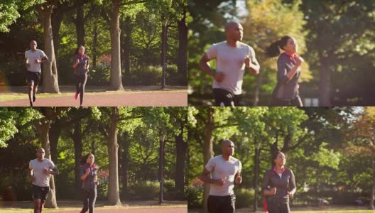 一对年轻的黑人夫妇在布鲁克林公园慢跑高清在线视频素材下载
