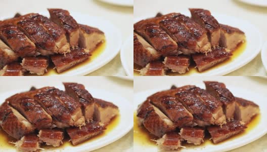 烤鹅和烤鸭是中国香港著名的烧烤美食高清在线视频素材下载