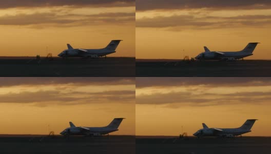 飞行员在机场的跑道上降落飞机高清在线视频素材下载