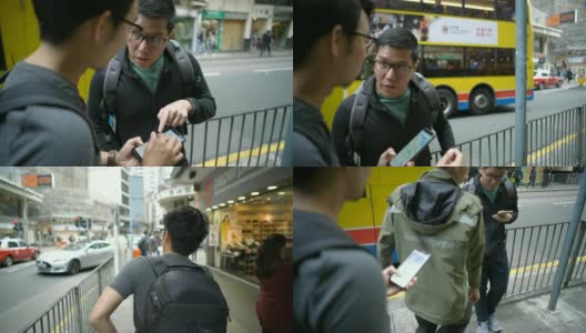 亚洲背包客通过电话向当地人问路高清在线视频素材下载