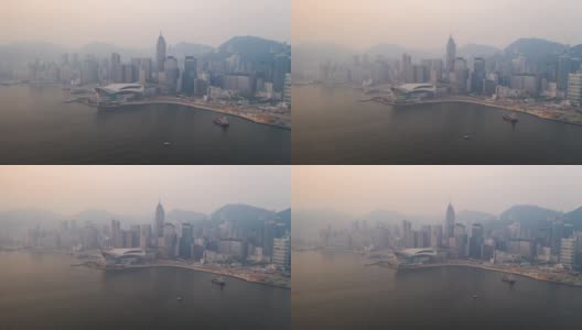4K Hyperlapse:鸟瞰图无人机飞越香港岛的摩天大楼与发展建筑、交通、能源电力基础设施。亚洲金融和商业中心高清在线视频素材下载