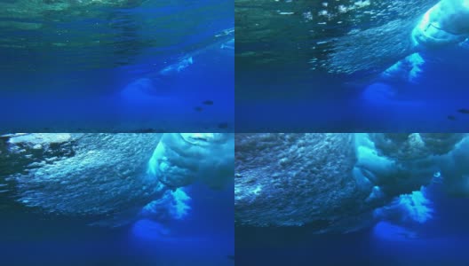 水下的观点，海浪打破礁。马尔代夫的越狱冲浪点高清在线视频素材下载