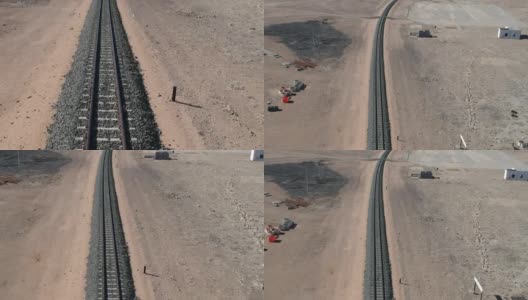 铁路蜿蜒穿过沙漠景观高清在线视频素材下载
