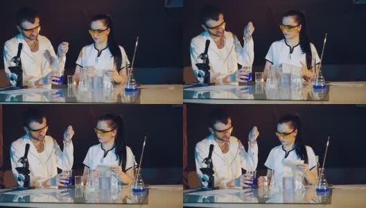 科学家们正在化学实验室里进行测量pH值的实验。高清在线视频素材下载