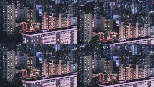 T/L HA TU住宅楼，窗户在夜里闪烁/中国北京高清在线视频素材下载