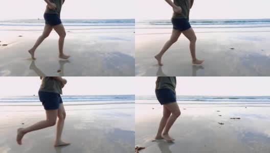 慢动作特写女人的腿跑在海滩上高清在线视频素材下载