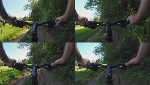 初夏在乡村公路上骑车高清在线视频素材下载