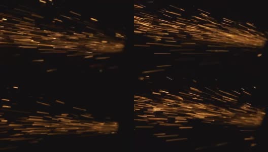 黄色的细颗粒在黑色背景上从右向左飞行高清在线视频素材下载