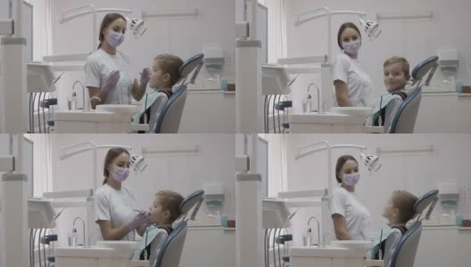 可爱的小男孩在牙医的招待会上高清在线视频素材下载
