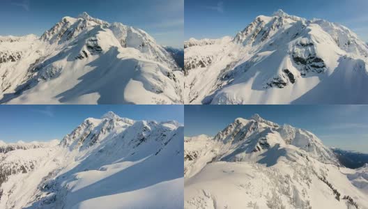 贝克山滑雪区空中直升机冬季雪地飞行滑雪单板滑雪徒步旅行在舒克山巨大的Mtn山顶上高清在线视频素材下载