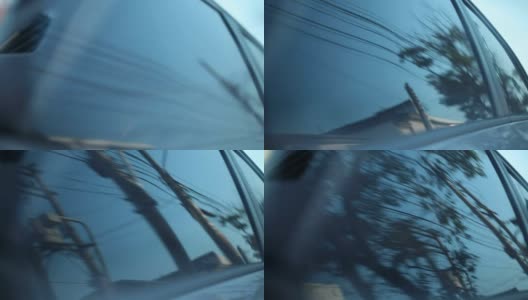 车窗艺术镜头。车窗上的汽车驾驶与城市倒影高清在线视频素材下载