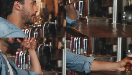 抑郁的男人在吧台喝啤酒高清在线视频素材下载