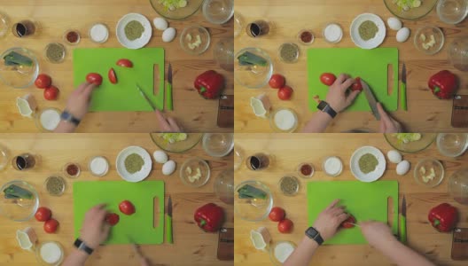 用大菜刀在砧板上切一个新鲜的番茄高清在线视频素材下载