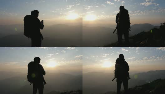 日落时分，徒步女子在山顶上用手机拍照，移动小车，慢动作高清在线视频素材下载