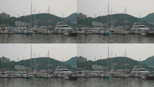 日落时分三亚市湾游艇码头大桥慢镜头全景4k中国海南高清在线视频素材下载