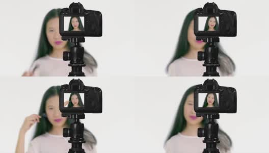 中国青少年用刷子化妆高清在线视频素材下载