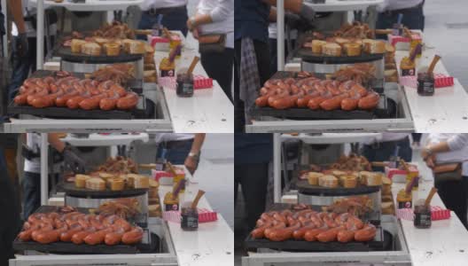 白天阿姆斯特丹城市中心街道食品市场猪肉香肠和面包慢镜头全景4k荷兰高清在线视频素材下载
