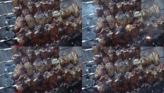 肉串，俄罗斯泥，在木炭灰烬上的传统烧烤，特写手拿高清在线视频素材下载