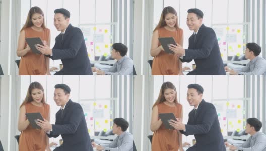 亚洲商务人士在办公室开会进行头脑风暴，亚洲经理手持平板电脑向同事展示工作计划项目，成功的商业理念，团队战略高清在线视频素材下载