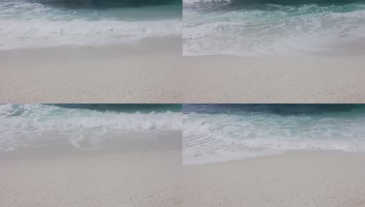 意大利撒丁岛海滩上海浪翻滚的景象。高清在线视频素材下载